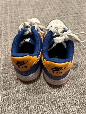 Nike Kids' Low-Top Sneakers in Blue, Yellow, and White